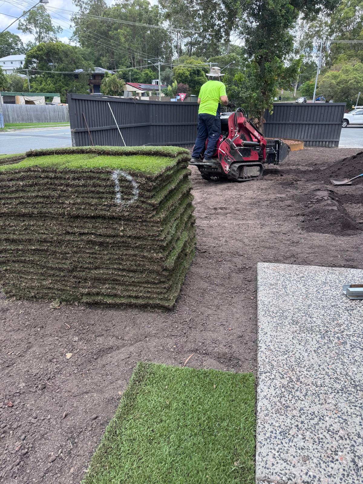 OMG Lawn Care landscaping work preparing soil and turf for a Brisbane property